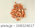 frosted king prawns closeup photo on white table background  108324617