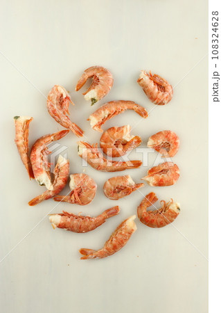 frosted king prawns closeup photo on white table background  108324628