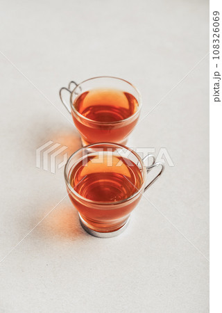 Tea  in a glass cups in row 108326069