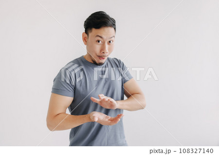 Happy man in blue t-shirt and jeans clapping hands stand isolated on white. 108327140