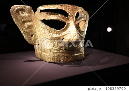 the golden mask and sculpture in Sanxingdui culture. it is is an archaeological site and a major Bronze Age culture in modern Guanghan, Sichuan. the golden mask and sculpture in Sanxingdui culture. it is is an archaeological site and a major Bronze Age culture in modern Guanghan, Sichuan. 108329790