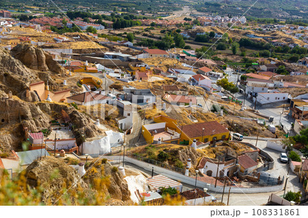 Guadix cave homes neighborhood seen from lookout balcony 108331861