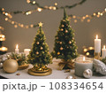 A Christmas tree in new year cozy home interior decorations. Garlands and bokeh burning candle. 108334654