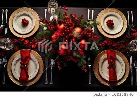 Christmas table setting with dishware, silverware and decorations on festive table. 108338240