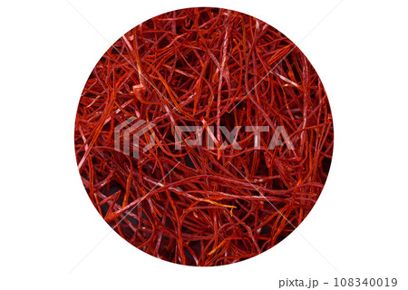 Red thin hot chili threads on a dark background 108340019