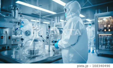 Scientists in Hazmat Sterile Suits in Technologically Advanced Laboratory 108340490