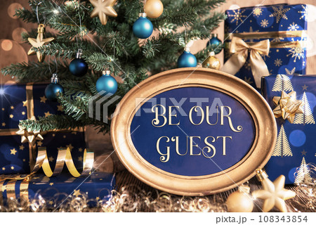 Oval Frame With Text be Our Guest, Christmas Tree Background 108343854