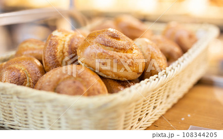 Delicious fresh butter buns in baskets in bakery 108344205