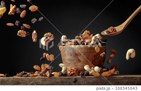 Flying dried fruits and nuts. Flying dried fruits and nuts. 108345043
