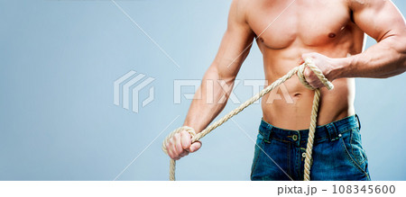 muscular man on gray background 108345600