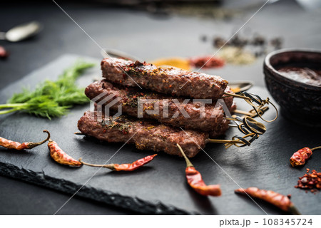Grilled kebab with spices 108345724