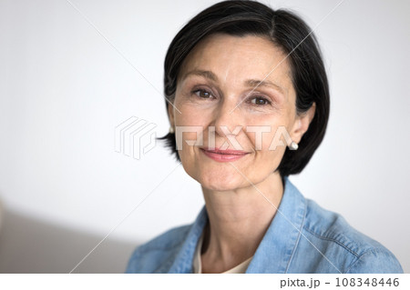 Close up head shot portrait good-looking mature woman Close up head shot portrait good-looking mature woman 108348446
