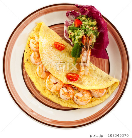 Omelette with shrimps and avocado salsa Omelette with shrimps and avocado salsa 108349370