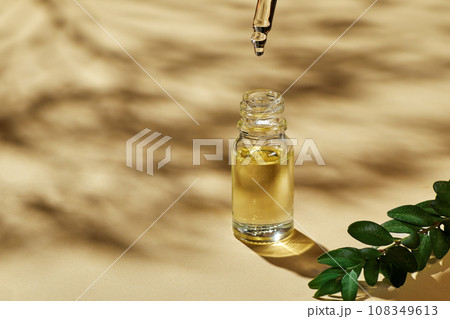 Oils for spa treatment in different glass bottles 108349613