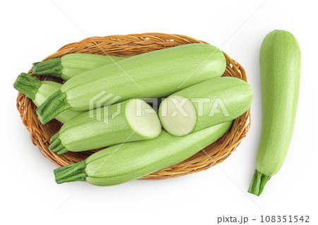 zucchini or marrow in a wicker basket isolated on white background with full depth of field. Top view. Flat lay 108351542
