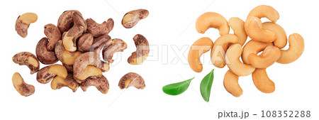 cashew nuts heap with shell isolated on white background. Top view. Flat lay cashew nuts heap with shell isolated on white background. Top view. Flat lay 108352288