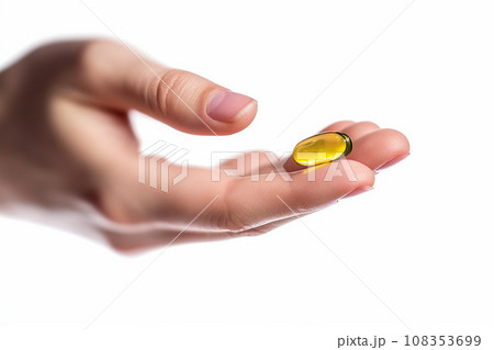 Fish oil capsule in a female hands isolated on white background 108353699