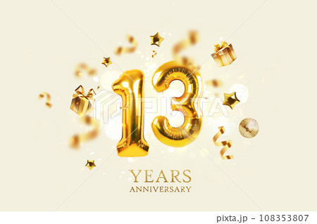 Gold festive balloons 13 year anniversary with golden confetti, presents, mirror ball and stars fly on a beige background with bokeh lights and sparks. Birthday luxury thirteen card, a creative idea 108353807