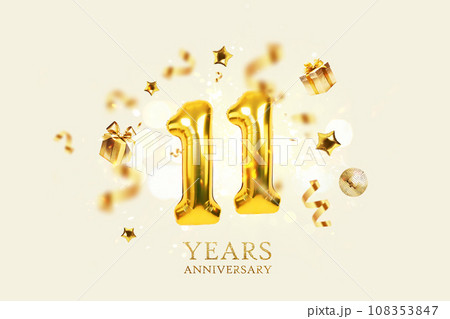 Gold festive balloons 11 years anniversary with golden confetti, presents, mirror ball and stars fly on a beige background with bokeh lights and sparks. Birthday luxury eleven card, a creative idea Gold festive balloons 11 years anniversary with golden confetti, presents, mirror ball and stars fly on a beige background with bokeh lights and sparks. Birthday luxury eleven card, a creative idea 108353847