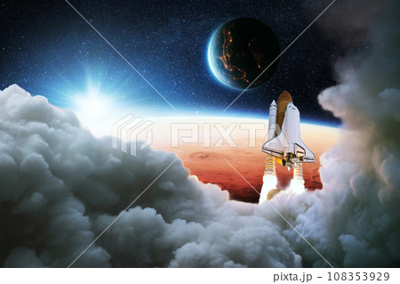 Space shuttle rocket with puffs of smoke successfully takes off to the red planet Mars and blue planet Earth at sunset. Rocket lift off. Successful start of a space mission. Travel to Mars Space shuttle rocket with puffs of smoke successfully takes off to the red planet Mars and blue planet Earth at sunset. Rocket lift off. Successful start of a space mission. Travel to Mars 108353929