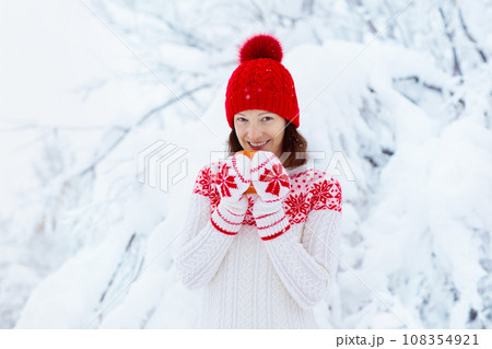 Woman drinks Christmas chocolate. Girl with cocoa. Woman drinks Christmas chocolate. Girl with cocoa. 108354921