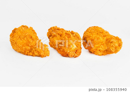 Breaded Chicken wings with salad on a White Background,food at home.Fast homemade food.Chicken Breaded Raw Meat. Fast cooking.semi-finished product, fried wings. Breaded Chicken wings with salad on a White Background,food at home.Fast homemade food.Chicken Breaded Raw Meat. Fast cooking.semi-finished product, fried wings. 108355940