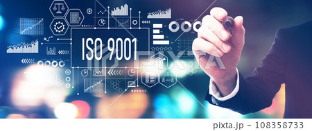 ISO 9001 theme with a businessman holding a marker 108358733