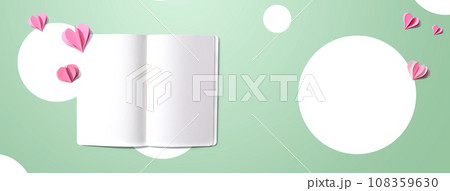 White notebook with paper hearts 108359630