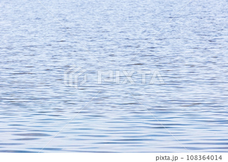 Light blue sea water surface with ripple pattern, natural background Light blue sea water surface with ripple pattern, natural background 108364014