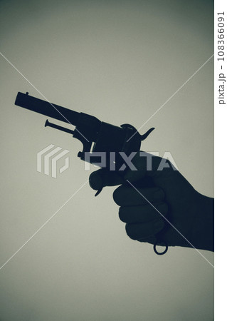 Gunman killer holding pistol artistic photo 108366091