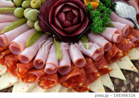 Classic Croatian starter plate with Fine Croatian ham, sliced salami and cheese 108366326