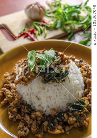 Minced pork with basil over rice is a Thai food that is popular among Thai people Minced pork with basil over rice is a Thai food that is popular among Thai people 108367049