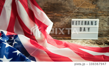 USA flag with a veterans day panel on the background 108367947