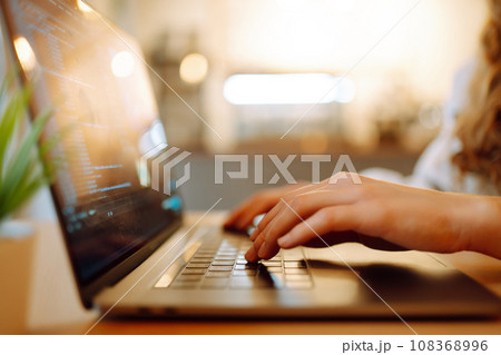 Female hands working on laptop, close-up. Technology, Freelance, online course, remote work concept. 108368996