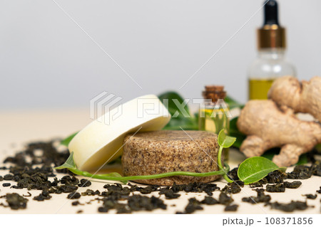 Solid shampoos made from ginger, green tea and oils. Natural cosmetics for hair care. Solid shampoos made from ginger, green tea and oils. Natural cosmetics for hair care. 108371856