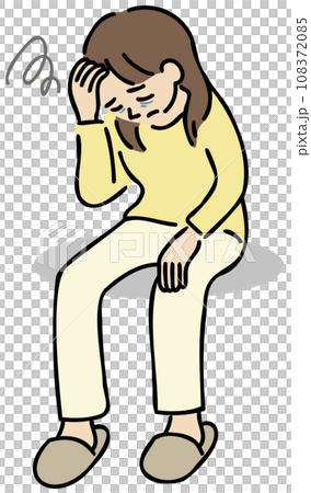A woman sitting down with her hand on her forehead 108372085