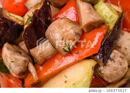 Delicious salad of grilled vegetables tomatoes, mushrooms, sweet peppers, eggplants 108373017