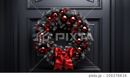 Beautiful Christmas wreath hanging on wooden door Beautiful Christmas wreath hanging on wooden door 108376616