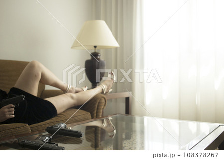 Spy thriller lady with pistol 108378267
