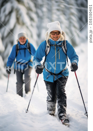 An adult couple takes a skiing walk through winter forest, outdoor recreation in forest. Vertical frame and invitation to Christmas and New Year's holidays in nature, idea for postcard and advertising 108380401