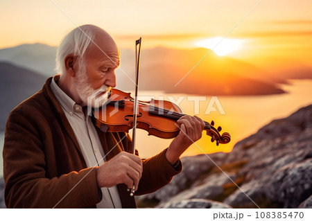 an old man plays the violin against the backdrop of sunset. Neural network AI generated art 108385470