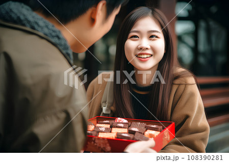 バレンタインチョコを渡す女性　AI生成 108390281