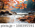 秋の紅葉と川の流れ 108395591