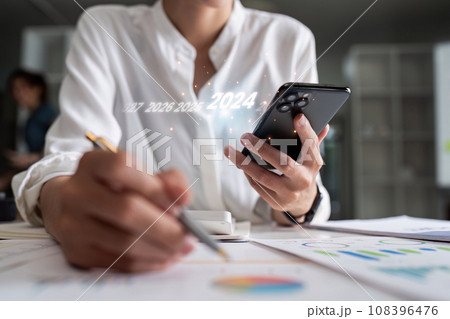 Analytical business people planning business growth 2024, strategy digital marketing, profit income 108396476