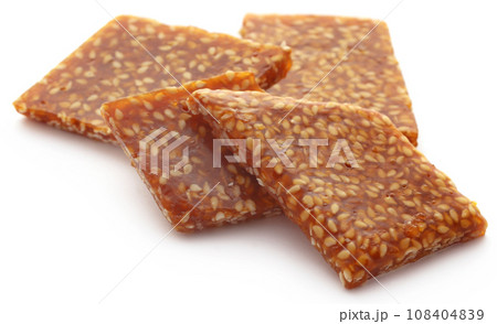 Sesame caramel candy 108404839