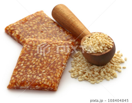 Sesame caramel candy 108404845