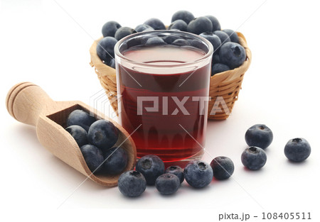 Group of fresh blueberries with juice 108405511