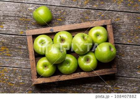 Wooden box with fresh green apples Wooden box with fresh green apples 108407882