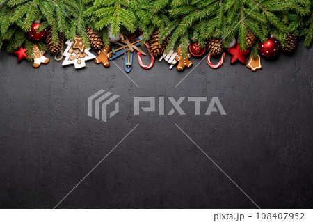 Christmas fir tree branch with decor and space 108407952