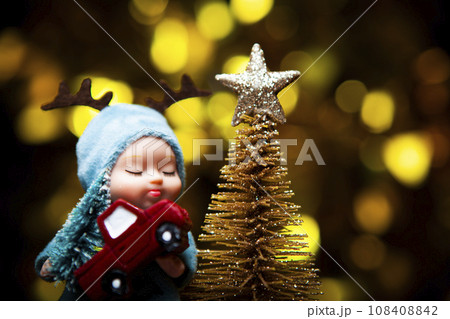 image of doll new year toy truck gold fir tree dark background image of doll new year toy truck gold fir tree dark background 108408842